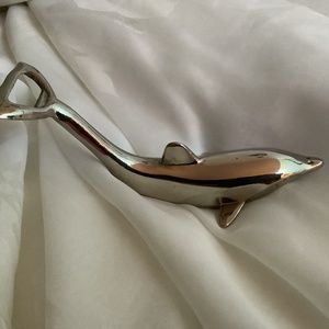 Silver dolphin bottle opener.